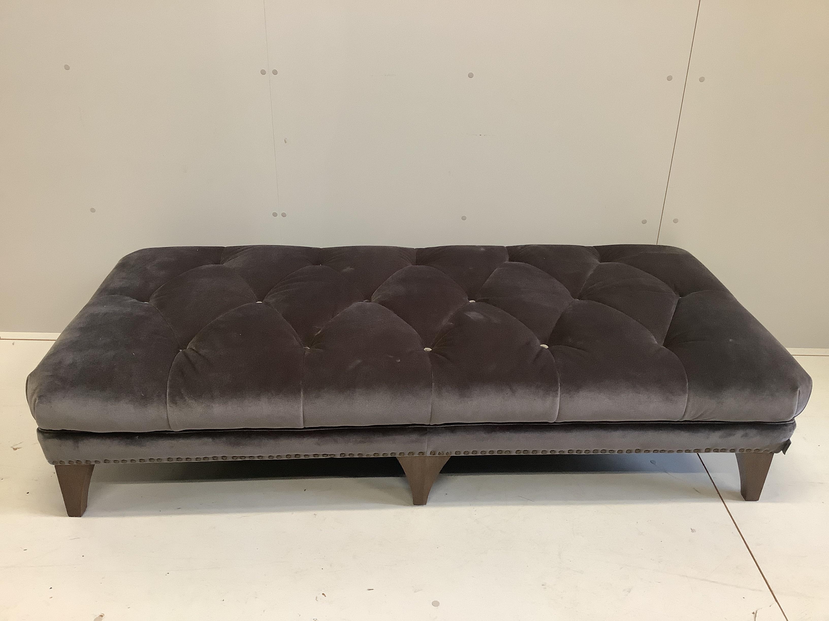 A large rectangular contemporary footstool by Alexander James, width 174cm, depth 82cm, height 40cm